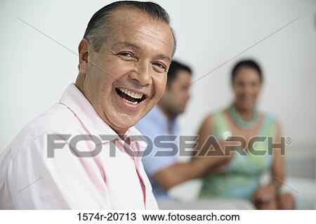 Portrait of a mature man laughing View Large Photo Image Stock Image - Portrait of a mature man laughing. Fotosearch