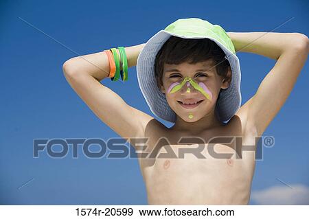 Portrait of a boy with a painted face smiling View Large Photo Image Stock Photo - Portrait of a boy with a painted face smiling. Fotosearch