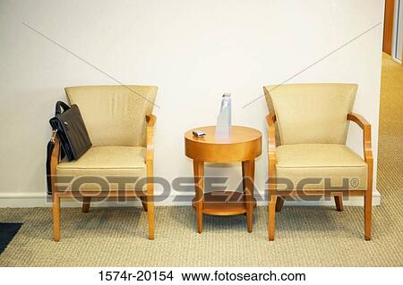 Close-up of a table and two armchairs View Large Photo Image Picture - Close-up of a table and two armchairs. Fotosearch