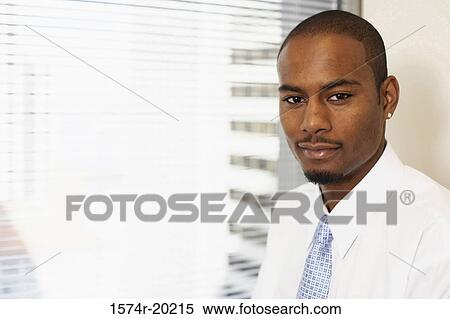 Portrait of a businessman View Large Photo Image Stock Photography - Portrait of a businessman. Fotosearch