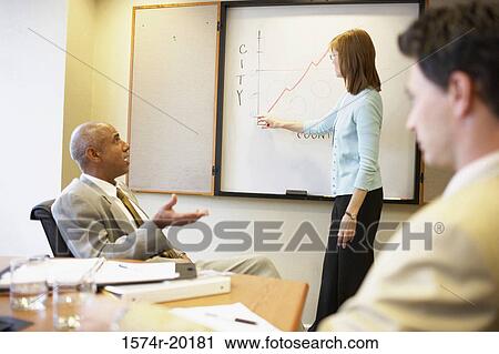 Side profile of a businesswoman giving a presentation View Large Photo Image Stock Image - Side profile of a businesswoman giving a presentation. Fotosearch