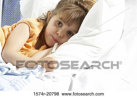 Portrait of a girl with a thermometer in her mouth View Large Photo Image Stock Photo - Portrait of a girl with a thermometer in her mouth. Fotosearch