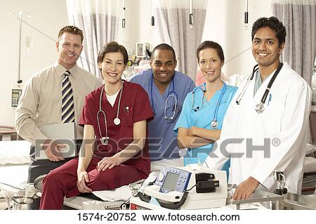 Portrait of three male doctors and two female doctors smiling View Large Photo Image Stock Image - Portrait of three male doctors and two female doctors smiling. Fotosearch