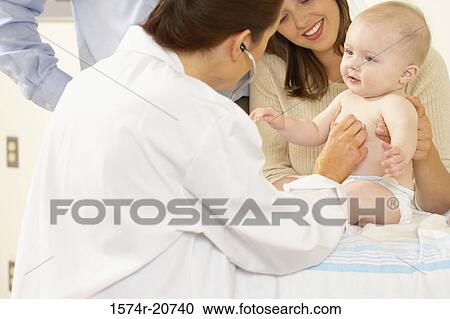 Side profile of a female doctor examining a baby boy with a stethoscope View Large Photo Image Stock Image - Side profile of a female doctor examining a baby boy with a stethoscope. Fotosearch