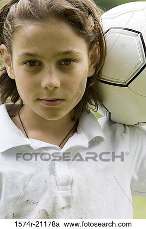 Portrait of a boy holding a soccer ball View Large Photo Image Stock Image - Portrait of a boy holding a soccer ball. Fotosearch