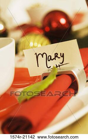Stock Image - Close-up of a napkin with a tag on it. Fotosearch