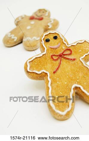 Stock Photograph - Close-up of two gingerbread men. Fotosearch