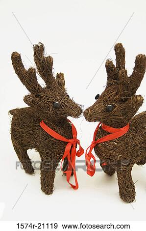 Close-up of two reindeer decorations View Large Photo Image Stock Photo - Close-up of two reindeer decorations. Fotosearch