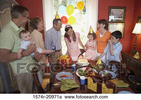 Family at a birthday party View Large Photo Image Stock Image - Family at a birthday party. Fotosearch