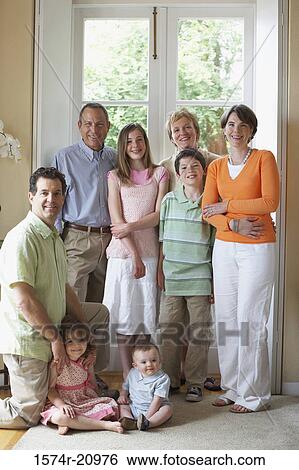 Stock Photograph - Portrait of a family smiling. Fotosearch