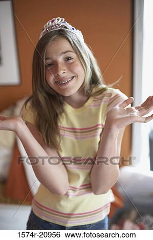 Portrait of a teenage girl gesturing with her hands View Large Photo Image Stock Photograph - Portrait of a teenage girl gesturing with her hands. Fotosearch