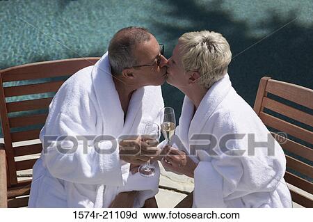 Close-up of a mature couple kissing each other View Large Photo Image Stock Image - Close-up of a mature couple kissing each other. Fotosearch