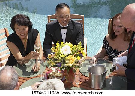 High angle view of five mature people sitting in chairs at poolside View Large Photo Image Stock Image - High angle view of five mature people sitting in chairs at poolside. Fotosearch