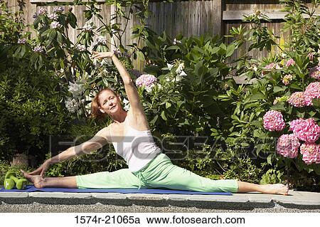 Mature woman exercising View Large Photo Image Stock Image - Mature woman exercising. Fotosearch