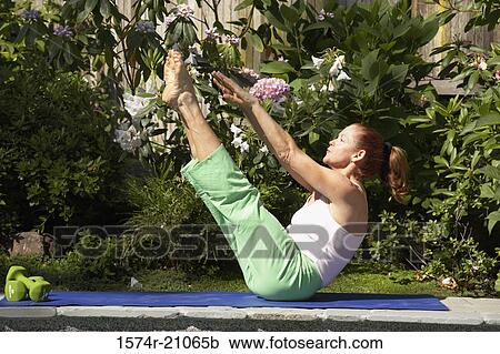 Side profile of a mature woman exercising View Large Photo Image Stock Image - Side profile of a mature woman exercising. Fotosearch