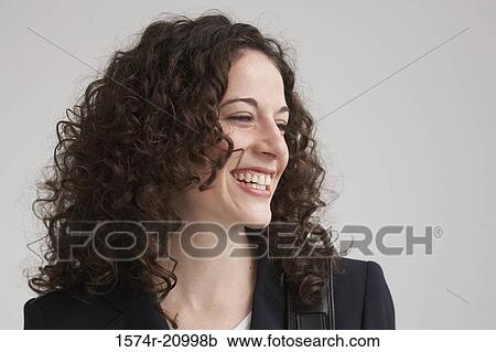 Close-up of a businesswoman smiling View Large Photo Image Stock Image - Close-up of a businesswoman smiling. Fotosearch