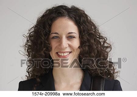 Portrait of a businesswoman smiling View Large Photo Image Stock Image - Portrait of a businesswoman smiling. Fotosearch