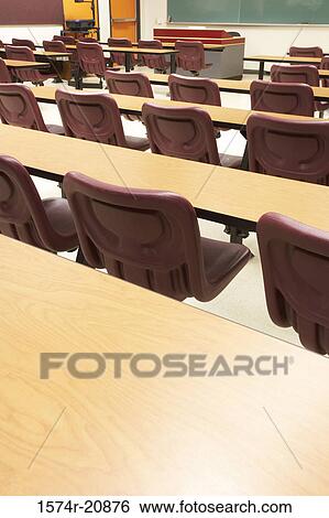 High angle view of tables and chairs in a lecture hall View Large Photo Image Stock Photograph - High angle view of tables and chairs in a lecture hall. Fotosearch