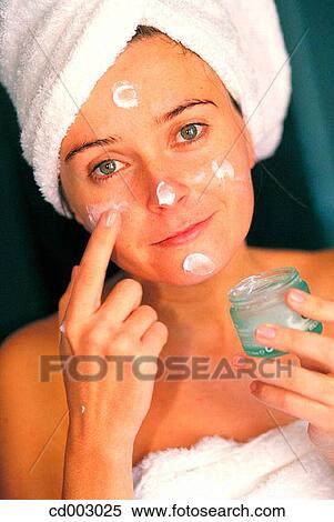 Stock Photography - activity, beauty, at-home, apply, action. Fotosearch