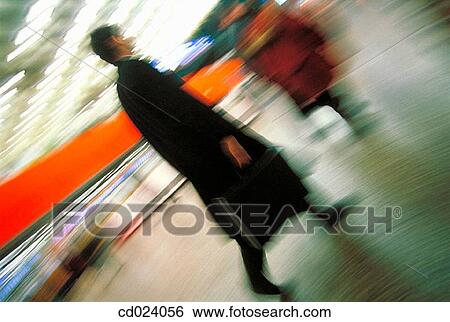 Stock Photograph - activity, business, blurred motion, airport, action. Fotosearch