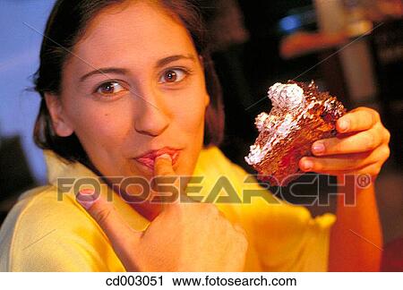 activity, cake, brunette, at-home, action View Large Photo Image Stock Image - activity, cake, brunette, at-home, action. Fotosearch