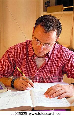 Stock Photography - adolescence, book, at-home, activity. Fotosearch