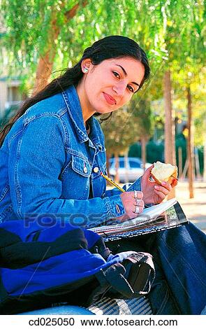 adolescence, brunette, blue, apple, activity View Large Photo Image Stock Image - adolescence, brunette, blue, apple, activity. Fotosearch