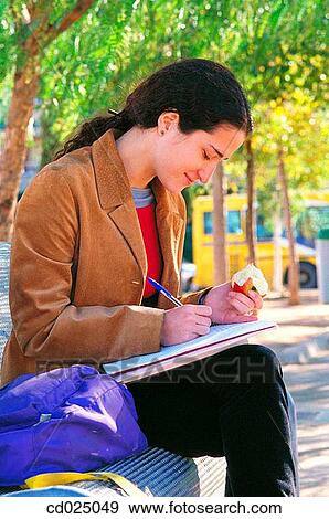 adolescence, College student, brunette, apple, activity View Large Photo Image Stock Photo - adolescence, College student, brunette, apple, activity. Fotosearch