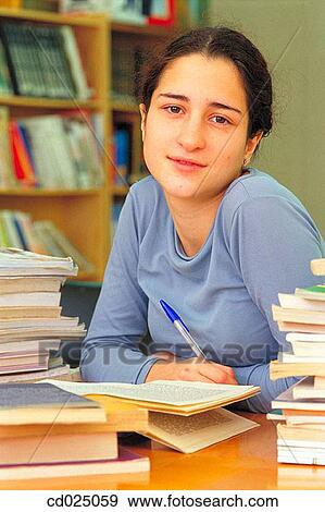 adolescence, College student, brunette, book, activity View Large Photo Image Stock Photo - adolescence, College student, brunette, book, activity. Fotosearch
