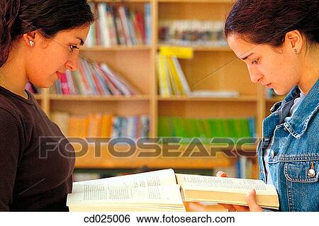 adolescence, College student, brunette, book, activity View Large Photo Image Stock Photograph - adolescence, College student, brunette, book, activity. Fotosearch