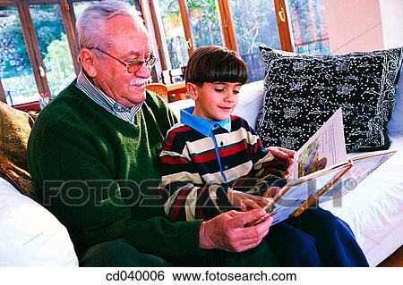 affection, boy, book, at-home, activity View Large Photo Image Stock Photograph - affection, boy, book, at-home, activity. Fotosearch