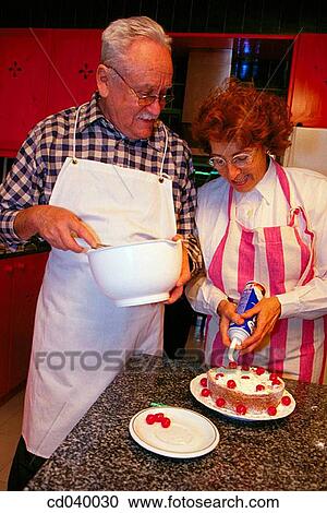 aged, cake, at-home, apron, activity View Large Photo Image Stock Image - aged, cake, at-home, apron, activity. Fotosearch