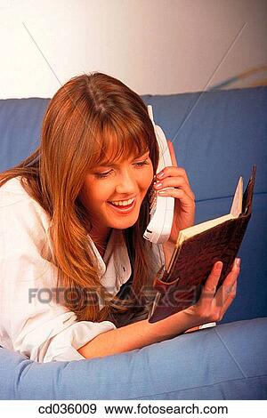 agenda, calling, brunette, at-home, activity View Large Photo Image Stock Photo - agenda, calling, brunette, at-home, activity. Fotosearch