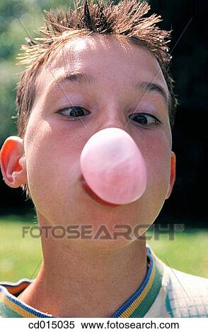 amusing, Chewing gum bubble, chewing gum, boy, ability View Large Photo Image Stock Photography - amusing, Chewing gum bubble, chewing gum, boy, ability. Fotosearch
