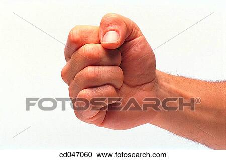 Stock Image - angry, Close-up, clipping path, Clenching fist, anger. Fotosearch