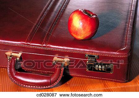 Stock Photo - Apple and briefcase. Fotosearch