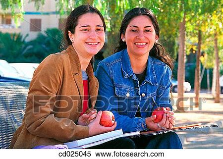 apple, College student, brunette, adolescence View Large Photo Image Stock Photography - apple, College student, brunette, adolescence. Fotosearch