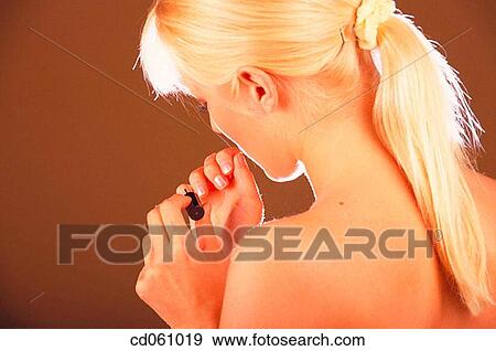 Stock Photo - apply, Beauty Care, beauty, back view, activity. Fotosearch