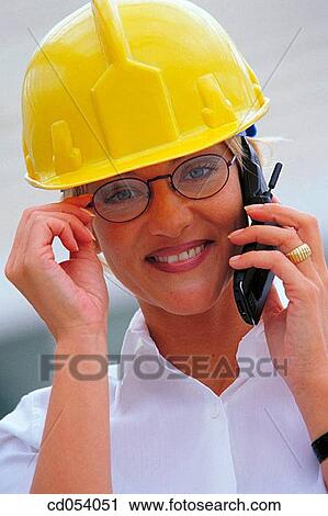 Architect talking on cell phone View Large Photo Image Stock Image - Architect talking on cell phone. Fotosearch