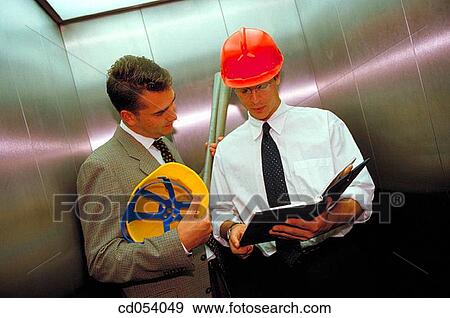 Architects in elevator View Large Photo Image Stock Photo - Architects in elevator. Fotosearch
