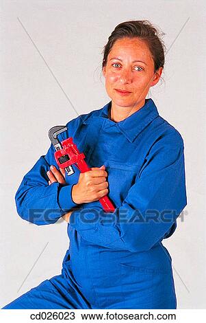 arms folded, brunette, boilersuit, blue, Arms crossed View Large Photo Image Stock Image - arms folded, brunette, boilersuit, blue, Arms crossed. Fotosearch