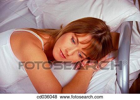 at-home, brunette, bed, absorbed View Large Photo Image Stock Photo - at-home, brunette, bed, absorbed. Fotosearch