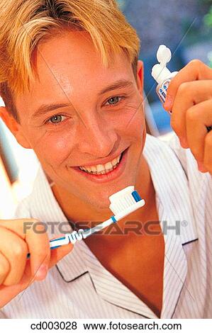 Stock Photo - at-home, brush, blond, activity. Fotosearch