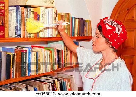 Stock Image - at-home, clean, book, activity. Fotosearch