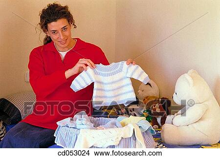 Picture - at-home, clothes, anticipation. Fotosearch