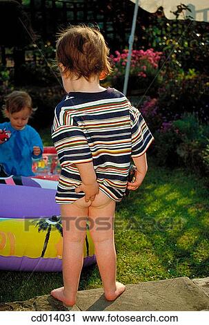 baby, back view, barefoot, boy, child View Large Photo Image Stock Image - baby, back view, barefoot, boy, child. Fotosearch