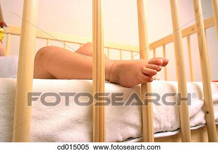 Stock Photography - baby, bar, barefoot, body, Body part, boy. Fotosearch