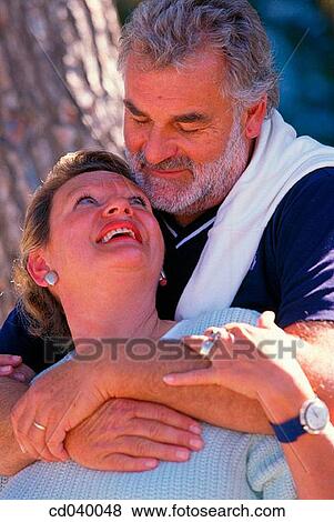 Stock Photo - baby boomer, Close-up, beard, affection. Fotosearch