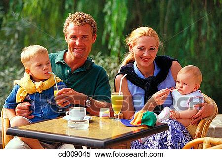 Stock Photography - baby, boy, cafe. Fotosearch