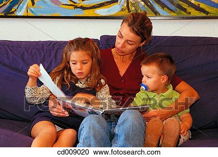 baby, brother, boy, book, at-home View Large Photo Image Stock Image - baby, brother, boy, book, at-home. Fotosearch